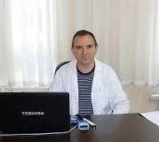 Dr. Hasan Koca