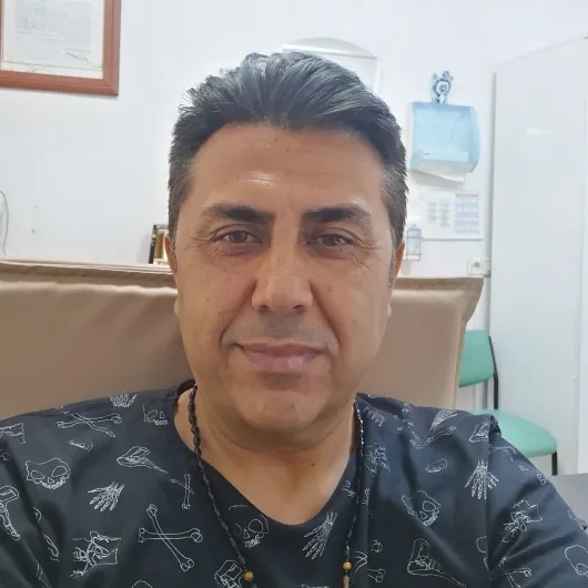 Dr. Naim Çakar